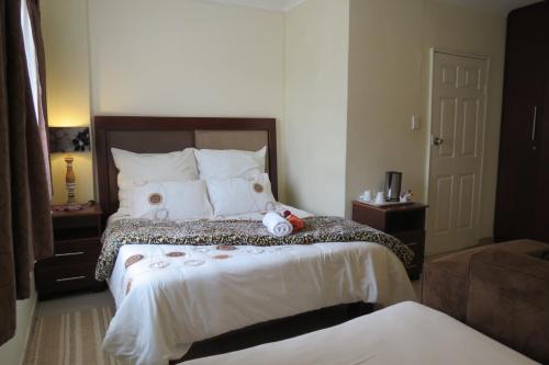 Ένα ή περισσότερα κρεβάτια σε δωμάτιο στο Bed and breakfast Newlife BNB