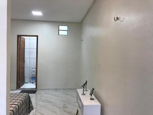 Bilik mandi di Flat com quarto e sala
