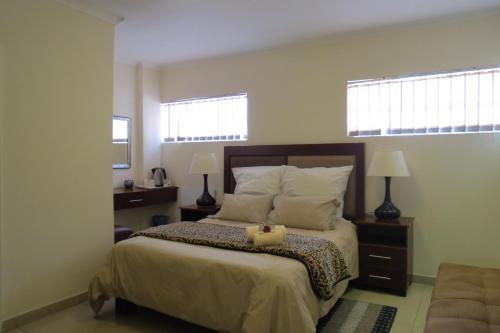 Ένα ή περισσότερα κρεβάτια σε δωμάτιο στο Bed and breakfast Newlife BNB