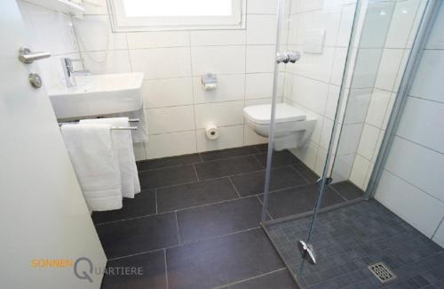 Koupelna v ubytování Apartments Boardinghaus Norderney