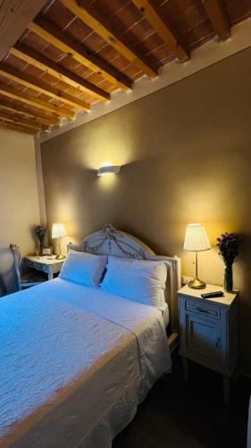 Postel nebo postele na pokoji v ubytování B&B La Bella Lucca