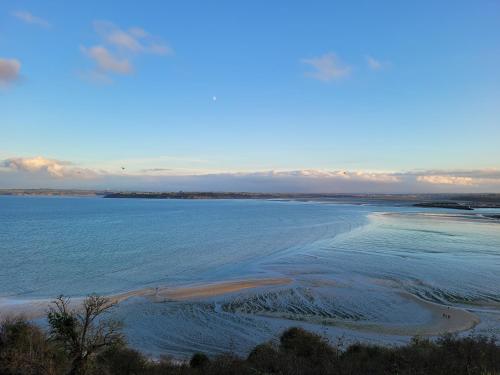 an aerial view of a beach with the ocean at Magnifique vue mer, plage & GR34 in Plérin