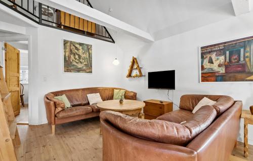 Et opholdsområde på Amazing Home In Blåvand With Wifi