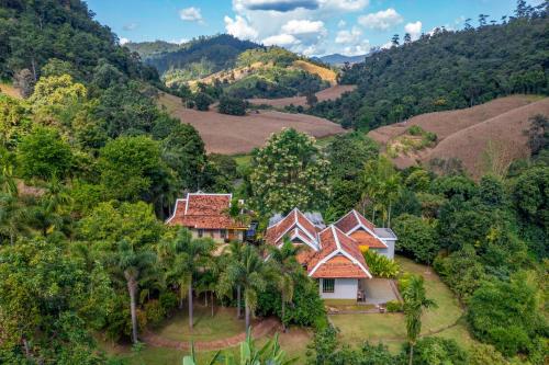 an aerial view of a house in the mountains at Kanlaya's Eyrie, Luxury Homestay in Pang Mapha