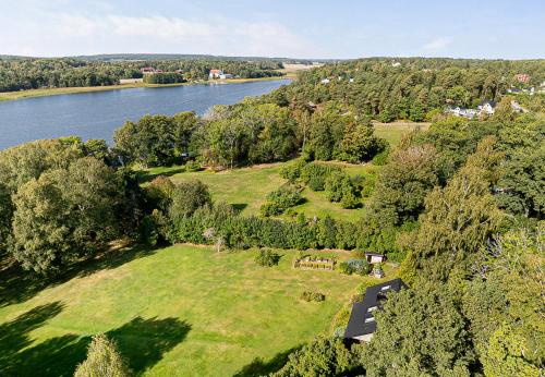 an aerial view of a park next to a river at Dream location with lake view & Top location near in Bro