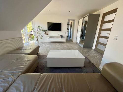 Katil atau katil-katil dalam bilik di Bagoly Apartman