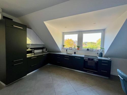 Dapur atau dapur kecil di Bagoly Apartman