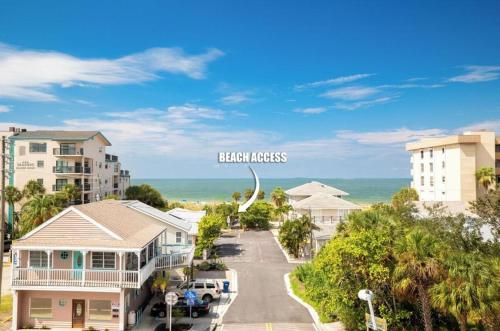 an aerial view of the beach houses and the ocean at Madeira Bay Resort I 1505 in St Pete Beach