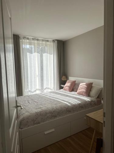 Katil atau katil-katil dalam bilik di Chambre chez l'habitant proche de paris