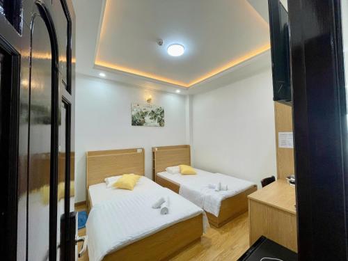 Ένα ή περισσότερα κρεβάτια σε δωμάτιο στο VICTORIA hotel