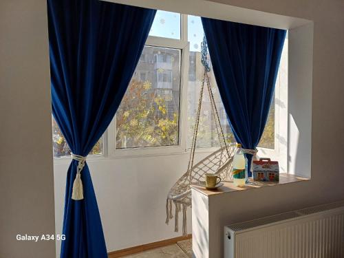 Φωτογραφία από το άλμπουμ του Garsoniera luminoasa στην Κραϊόβα