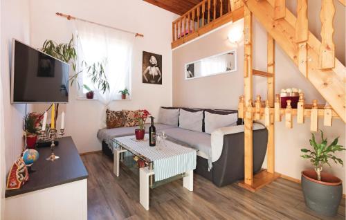 Posezení v ubytování Two-Bedroom Holiday Home In Valtura