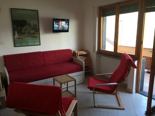 Et opholdsområde på Appartamento Romeo