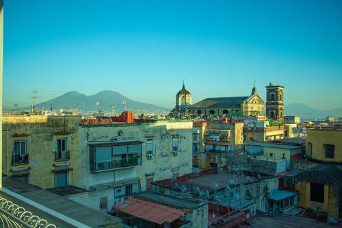 an aerial view of a city with buildings at WANDERLUST SPACCANAPOLI Points Of View in Naples