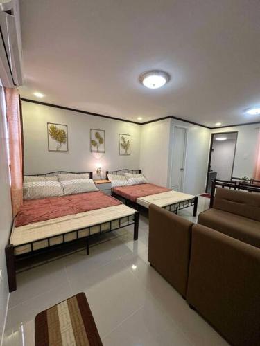Katil atau katil-katil dalam bilik di Noble Villa