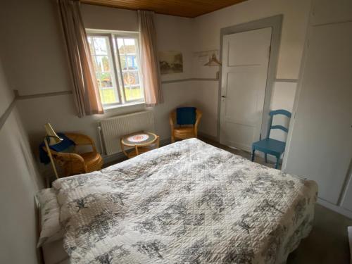 Postel nebo postele na pokoji v ubytování GRUBBE MØLLE Bed & Breakfast