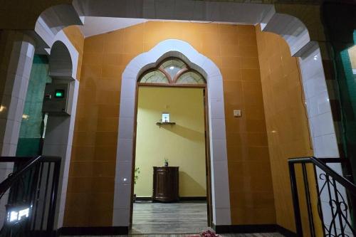 an entrance to a building with an arch doorway at Charming Goan Home in Old Goa in Old Goa