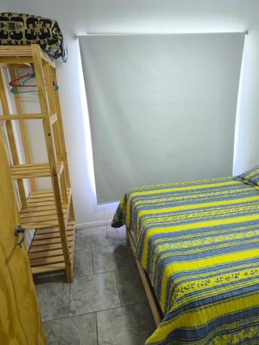 Ένα ή περισσότερα κρεβάτια σε δωμάτιο στο Leosanmareta