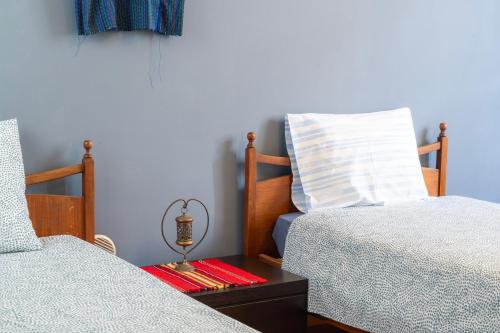 Ένα ή περισσότερα κρεβάτια σε δωμάτιο στο ANANKE Home