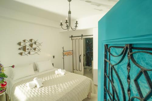 Ένα ή περισσότερα κρεβάτια σε δωμάτιο στο Seabed Suites Mykonos