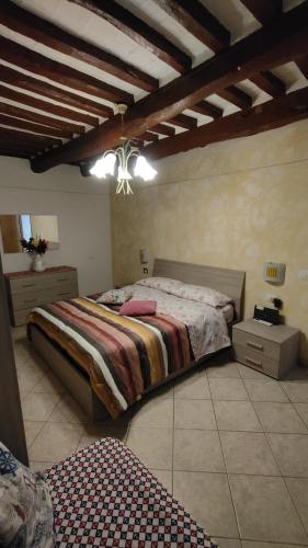 a bedroom with a large bed in a room at Casa Maria in Portoferraio