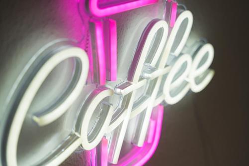 a close up of a neon sign that says disco at Lemon3 - SAP Arena & Maimarkt - Smart-TV - Self-Checkin - Free Parking in Mannheim