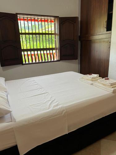 Postel nebo postele na pokoji v ubytování Hostal Artesanos