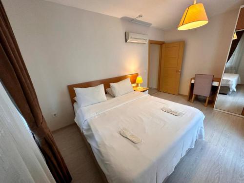 Katil atau katil-katil dalam bilik di Şeker Apartments