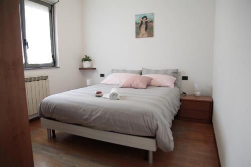 Postel nebo postele na pokoji v ubytování La casa di Dany e Laura