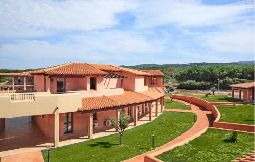 an aerial view of a house with a yard at Vignola Baia Dei Mirti M3 in Vignola Mare