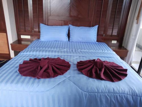 Ένα ή περισσότερα κρεβάτια σε δωμάτιο στο Patong Tower Apartment - AMP