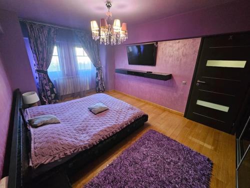 Postel nebo postele na pokoji v ubytování Apartament Baroque Central