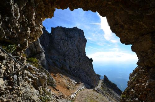 a view from a cave in a mountain cliff at Kaiserhof in Reichenau