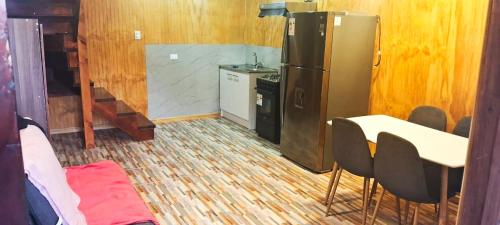 Kuchyň nebo kuchyňský kout v ubytování Cabaña nely