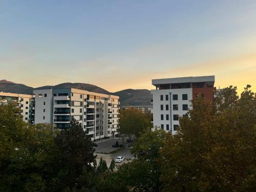 a group of apartment buildings in a city at Apartment Lola in Trebinje