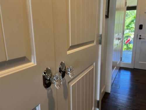 ajar door with a door knob on a house at Kaanapali's Royal Luxury Plantation Beach & Golf Retreat in Kaanapali