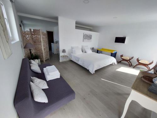 Ένα ή περισσότερα κρεβάτια σε δωμάτιο στο La Finca de Ananás - Suite privada con entrada independiente