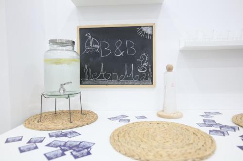 a classroom with a chalkboard and a table with a small figurine on top at B&B AnMa in Ercolano