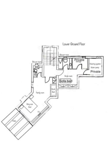 a floor plan of the lower grant floor at Luxury Cycladic Villa-Enjoy Infinity Pool Sunsets in Koundouros