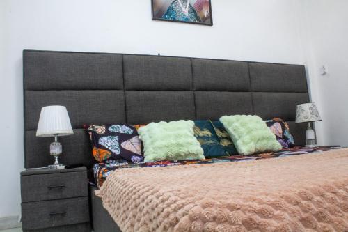 Postel nebo postele na pokoji v ubytování Happyhomes