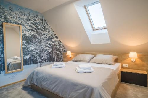 Postel nebo postele na pokoji v ubytování Apartmán Mariana