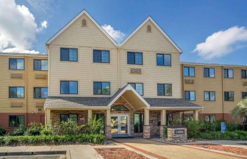 a large apartment building with at Extended Stay America Suites - Charleston - Airport in Charleston