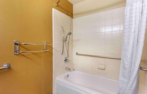 a bathroom with a white tub and a shower at Extended Stay America Suites - Seattle - Southcenter in Tukwila