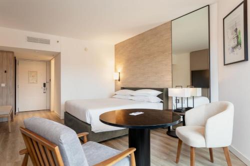 Ένα ή περισσότερα κρεβάτια σε δωμάτιο στο Sheraton Buenos Aires Hotel & Convention Center