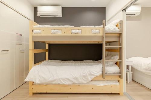 a bunk bed room with two bunk beds at residence MINAMI-AOYAMA102 in Tokyo