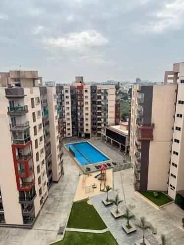 an aerial view of an apartment complex with a swimming pool at 6Floor in society Ecity ph2 Near TCS Tech Mahindra in Bengaluru