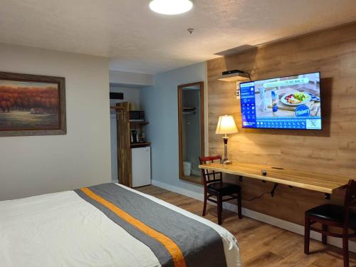 Postel nebo postele na pokoji v ubytování Harbour Light Motel