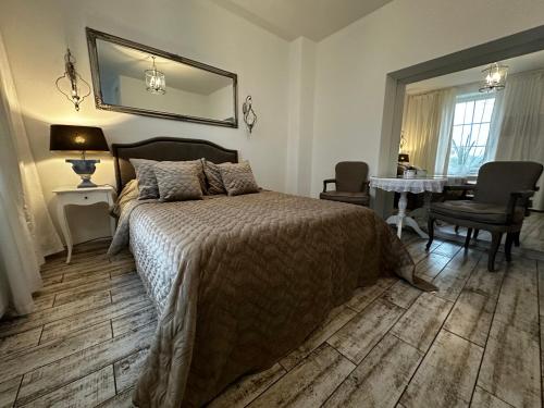 Posteľ alebo postele v izbe v ubytovaní Apartamencik Królewiecka