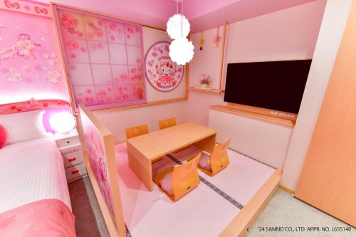 Postel nebo postele na pokoji v ubytování Asakusa Tobu Hotel