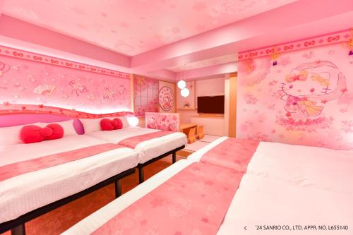 Postel nebo postele na pokoji v ubytování Asakusa Tobu Hotel